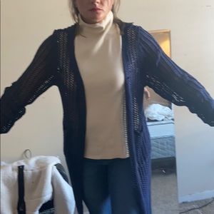 Knitted cardigan with sleeveless beige turtleneck